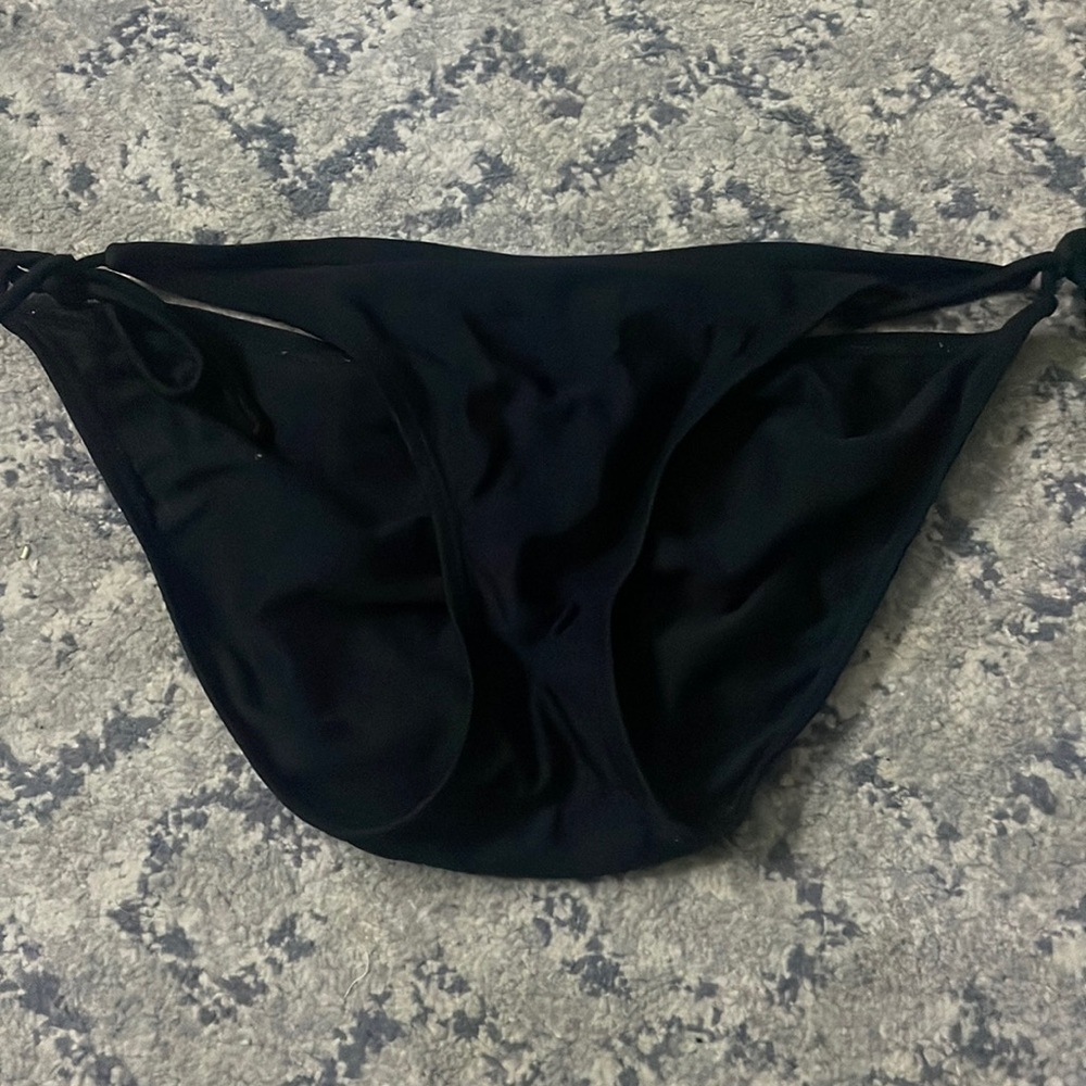 Black bathing suit bottoms.